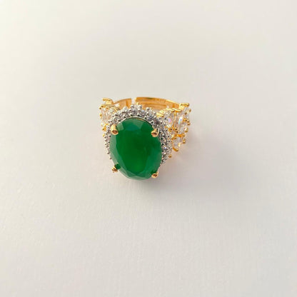 Oval Green Center Stone Surrounded by Small Diamond Gold Plated Ring