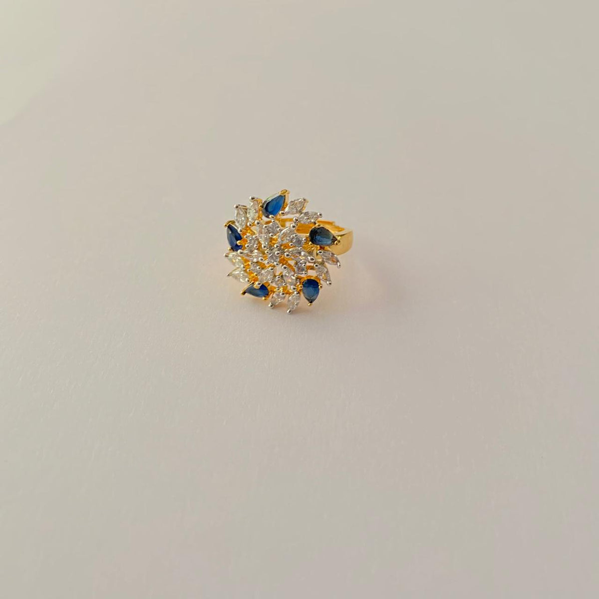 Diamond Gold Plated Surrounded by Drop Design Blue Stone Small Ring