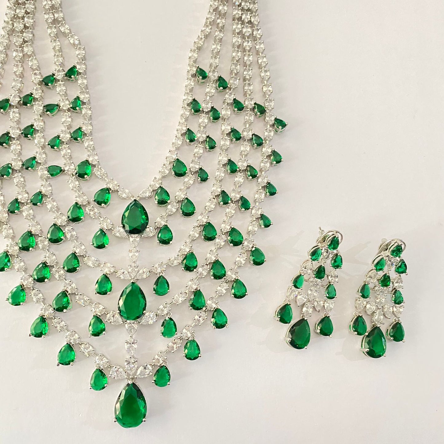 Silver plated gorgeous diamond and emerald necklace designs Set